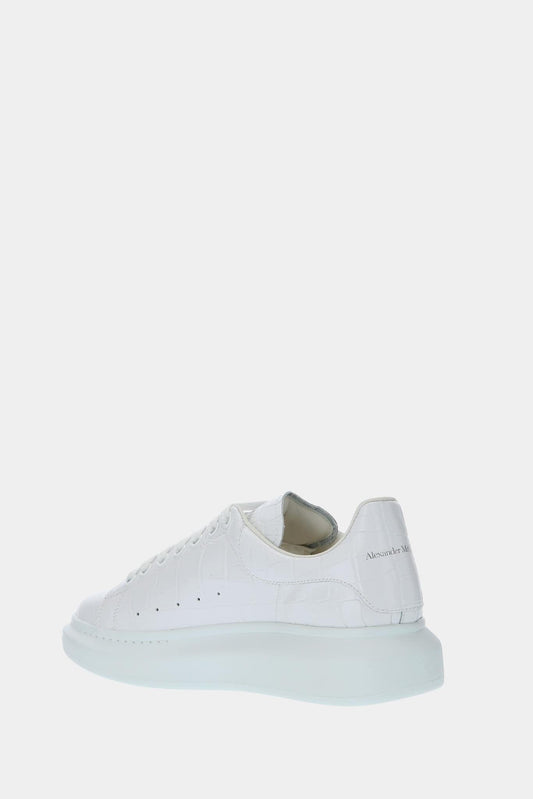 LECLAIREUR - Alexander McQueen Baskets basses "Oversized" en cuir de veau blanc embossé