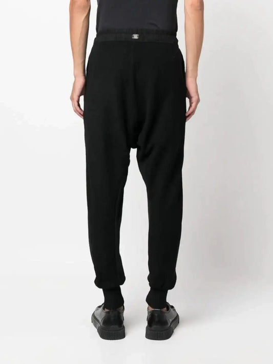 69 by Isaac Sellam Jogging pants with logo plaque