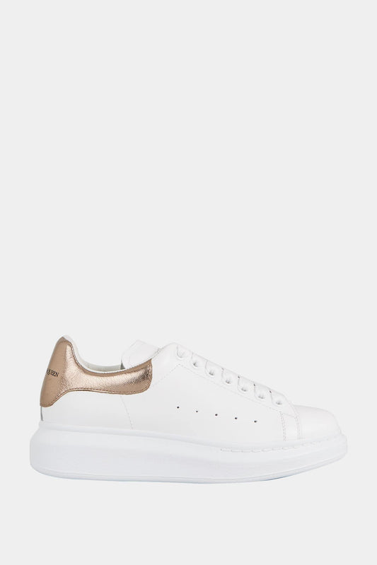 Alexander McQueen Baskets basses "Oversized" blanches et or rose - LECLAIREUR