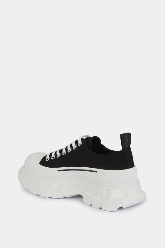 Alexander McQueen Baskets basses " Tread slick" en toile noire - LECLAIREUR