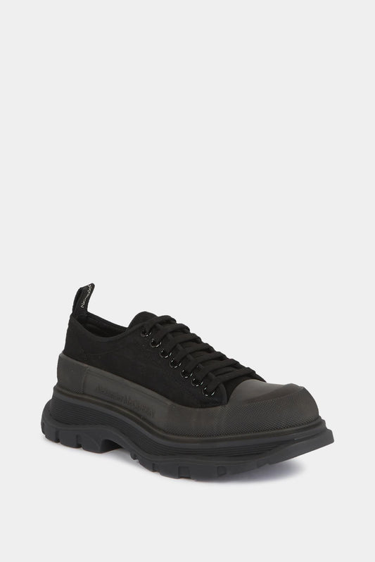 Alexander McQueen "Tread slick" low-top sneakers in black canvas with shiny effect