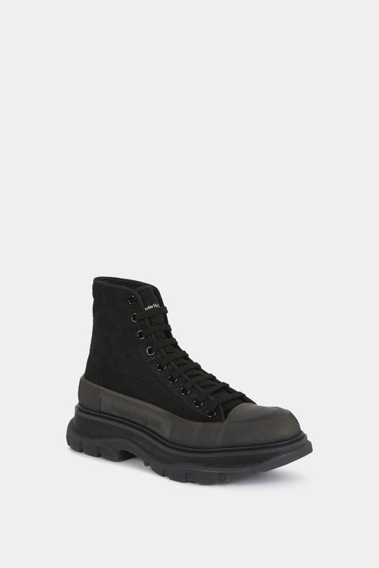Alexander McQueen High "Tread Slick" sneakers in brilliant black canvas
