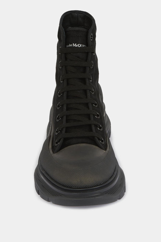 Alexander McQueen Baskets hautes" Tread slick" en toile noire à effet brillant - LECLAIREUR
