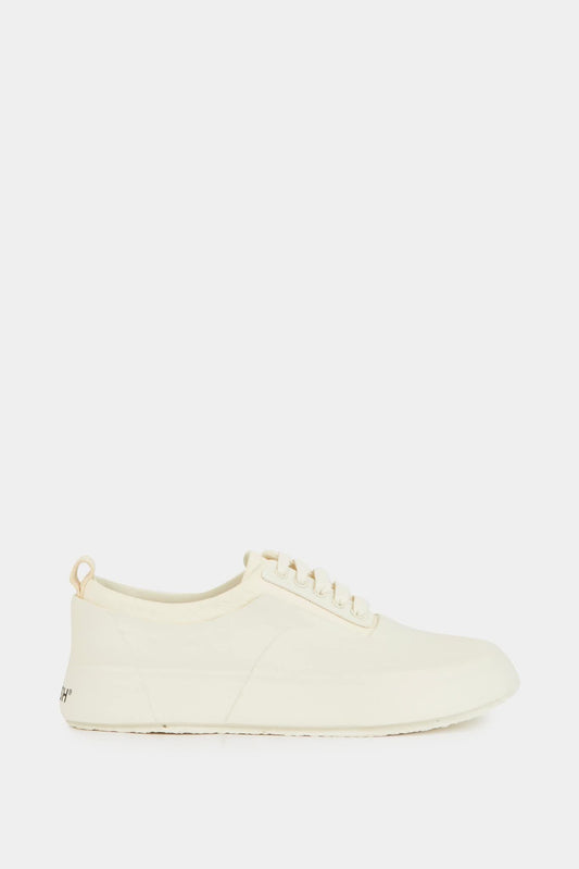 White leather and rubber low top sneakers