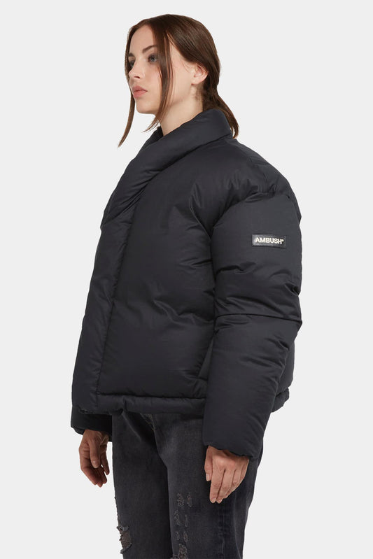 Black puffer jacket with logo patch