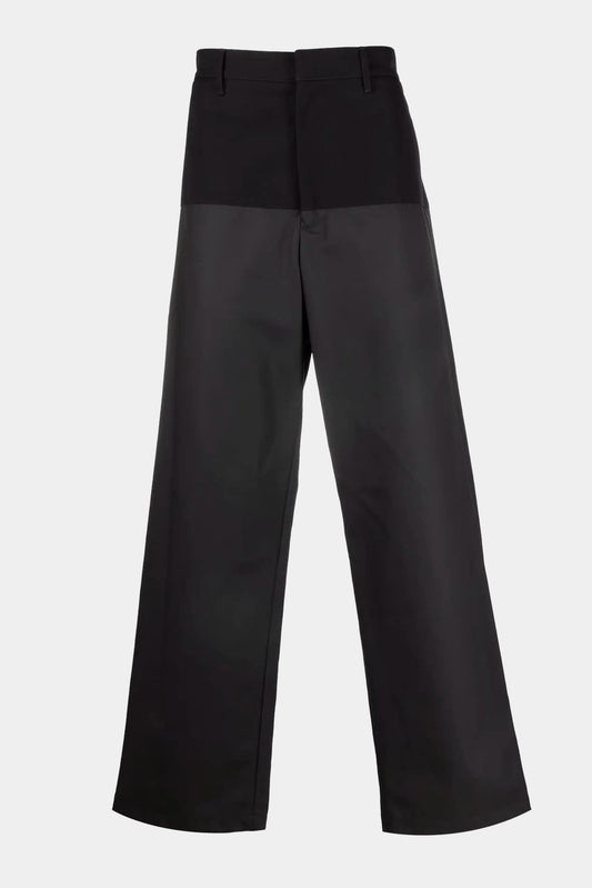 black pants with bi-material waxed effect