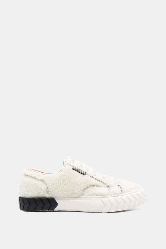 Both "Tyres" beige synthetic shearling low top sneakers