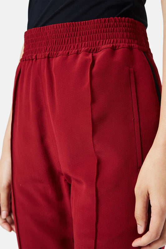 Haider Ackermann Pantalon slim en soie rouge - LECLAIREUR