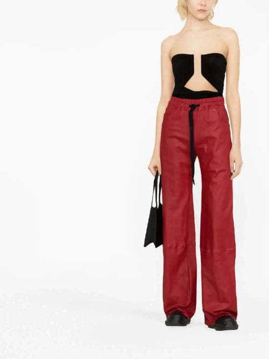 Isaac Sellam Pantalon ample "ELEPANT" en cuir rouge - LECLAIREUR