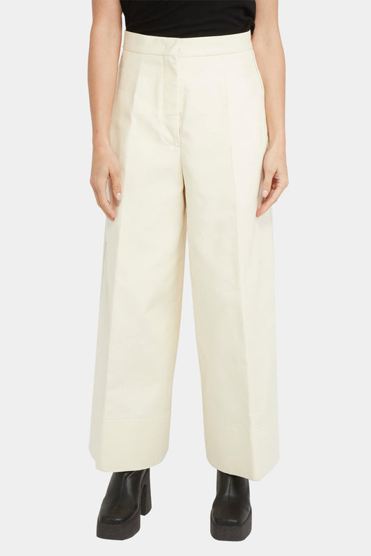 Jil Sander Pantalon large en coton beige - LECLAIREUR
