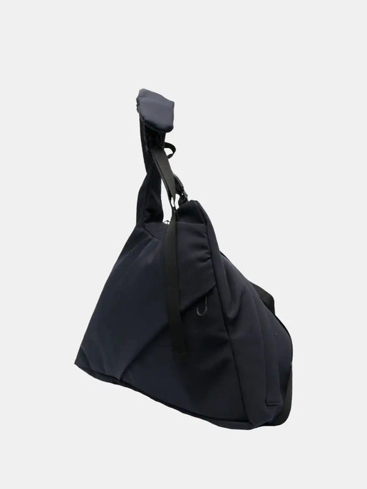 Johanna Parv Asymmetric bag in navy blue fabric