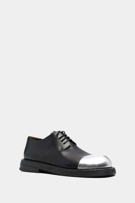 Black leather derby shoes with round toe in contrasting metal