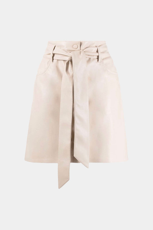 Nanushka mini-skirt "meda" in beige vegan leather