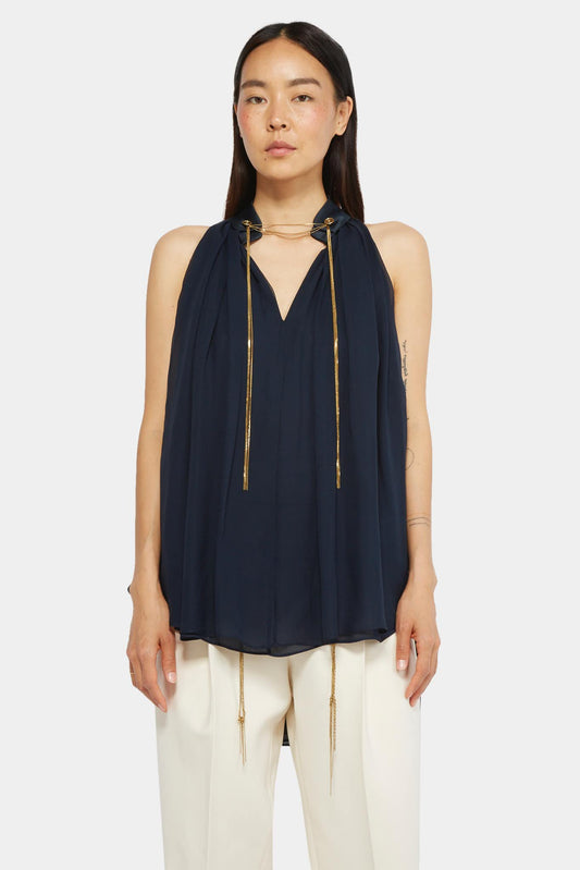 Navy blue top with draped effect